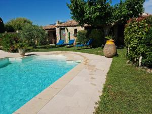 Maisons de vacances Un petit coin de Paradis : photos des chambres