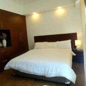 212B Amani Grand Resort Residences near Mactan Airport with pool, gym, wifi, netflix