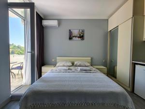 Апартаменты с видом на море и Батуми