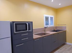 Petite maison dans un écrin de verdure