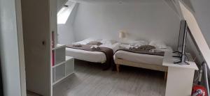 Maisons de vacances Gite isigny omaha : photos des chambres
