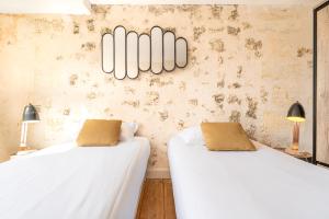 Magnifiques Appartements sur les Quais de Bordeaux : photos des chambres