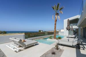 New Beachfront Mesogaia Villa with Heated Pool, Jacuzzi & Playroom, 60m from the beach