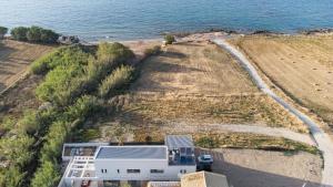 New Beachfront Mesogaia Villa with Heated Pool, Jacuzzi & Playroom, 60m from the beach