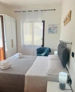 Il Canarino affittacamere - La Caletta