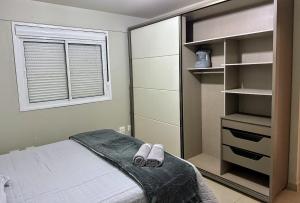 Apartamento com churrasqueira Centro 1 min do lago