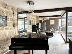 Villas Grand loft proche du centre avec jardin et piscine : photos des chambres