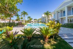 Casas em condomínio próximo a Praia de Pitinga - MGI