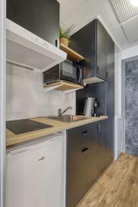 Appartements Studio Victoria CHIC,au coeur du centre ville : photos des chambres