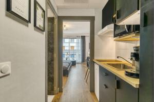 Appartements Studio Victoria CHIC,au coeur du centre ville : photos des chambres