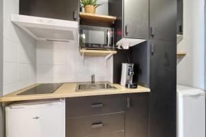 Appartements Studio Victoria CHIC,au coeur du centre ville : photos des chambres