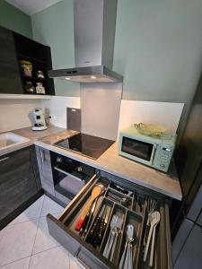 Appartements F3 rez-de-chaussee Centre ville au calme avec Balcon Garage et Netflix : photos des chambres