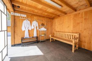 Yellow Tiny House with shared pool