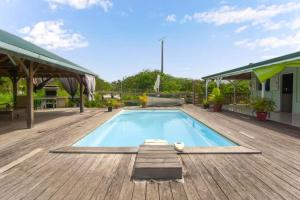 Bungalow à petit Macabou piscine & plage à proximité