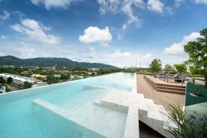 Greenery Views 1 BR Laguna SkyLine Apartment B2512 just 10 min walk Bangtao Beach