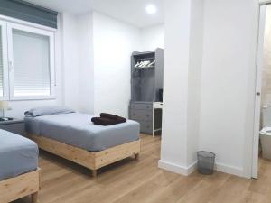 Casa de Huéspedes 12 Octubre Rooms