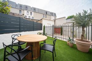Appartements Le Jardin De Guilbaud - Hypercentre - Netflix : photos des chambres
