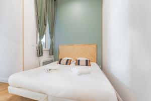 Appartements Appartement aux Portes du Jardin Public : photos des chambres