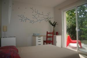 Villas Maison avec piscine chauffee entre ocean et bassin : photos des chambres