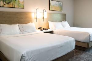 Queen Room with Two Queen Beds room in Holiday Inn Austin Conference Center an IHG Hotel