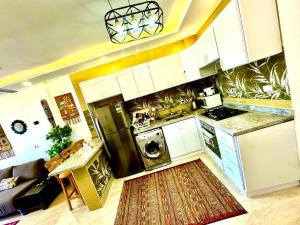 رويال بيتش رأس الحكمة ميني فيلا 2 نوم مكيف كامل صف اول بحر استاند الون عائلات فقط