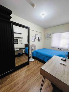 2-bedroom with Balcony in a Resort Setting - H Ivory