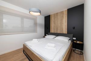 Aqua Blue by Belmont Realty