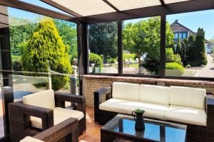 Moderne Ferienwohnung mit Sonnenterrasse & Gartenblick - Strandnah und Parkplatz in ruhiger Lage - hoher Schlafkomfort