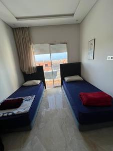 Appartement avec piscine à sidi rahhal plage