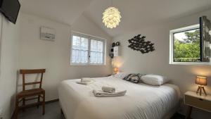 Maisons de vacances Les Alouettes, maison avec studio pour 4 personnes proche de la baie. : photos des chambres