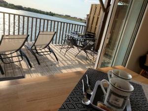 Appartements Cabane bois bord de l-eau : photos des chambres