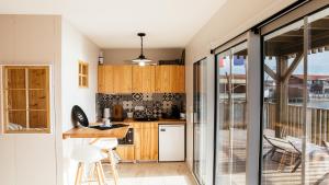 Appartements Cabane bois bord de l-eau : photos des chambres