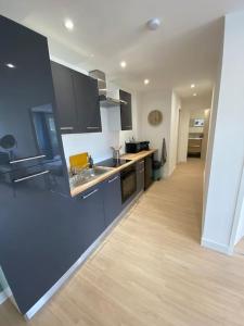 Appartement familial, 2 chambres, en RdC sur cour