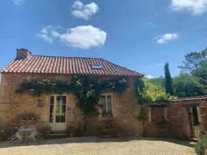 Maisons de vacances La petite maison de Larroque : photos des chambres