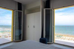 Family Room with Sea View room in Hotel Fedora Riccione
