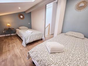 Appartements Au son de l-eau : photos des chambres