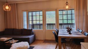 Loma-asunto Tahkon Alppitalossa