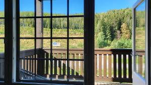 Loma-asunto Tahkon Alppitalossa