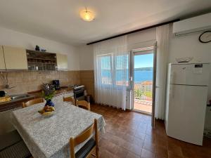 Apartmani Mona