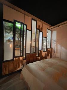 Loft Atypique - Climatisé - Hyper centre - Calme - Petite terrasse