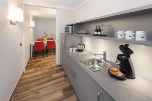Family Room  (2 Adults and 2 Children until 12 years) room in SI-SUITES