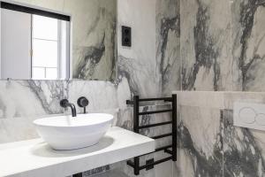 Appartements Pick A Flat's Apartment in Louvre - Croix des Petits Champs : photos des chambres