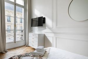Appartements Pick A Flat's Apartment in Louvre - Croix des Petits Champs : photos des chambres