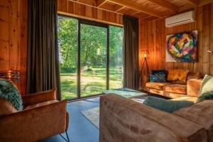 Wellnesslodge Scholekster met jacuzzi en uitzicht