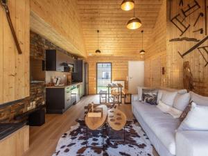 Lodge neuf avec grande terrasse et équipement haut de gamme - FR-1-401-292