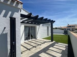 Maisons de vacances Maison de vacances avec jardin clos, a proximite de la plage de Barbatre, 6 couchages - FR-1-224B-227 : photos des chambres