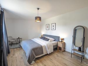 Appartements Le PRESTIGE 152 proche aeroport -gare Lyon -groupama stadium-ldlc arena : photos des chambres