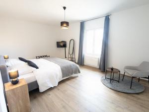 Appartements Le PRESTIGE 152 proche aeroport -gare Lyon -groupama stadium-ldlc arena : photos des chambres