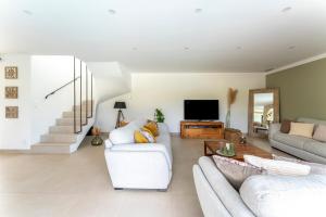 Villas Villa spacieuse et accueillante : photos des chambres