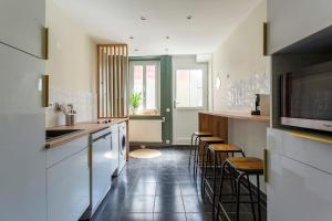 Appartements Maison Parmentier 10 min de Lyon : photos des chambres